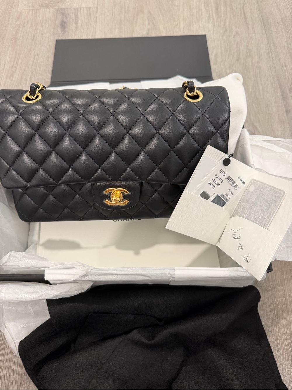 Chanel Classic Quilted Flap lamb skin Bag in Black with Gold Hardware like NEW